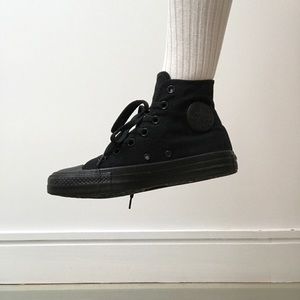 • Black high top chuck taylors